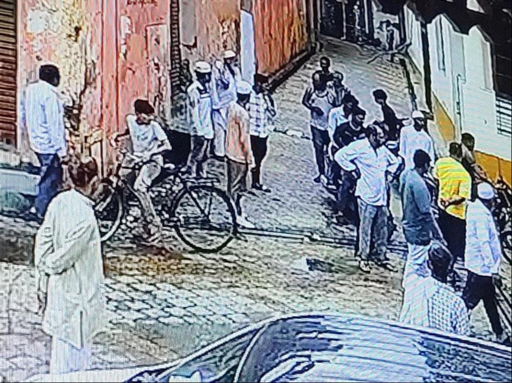 There was chaos when people gathered outside the house of the accused