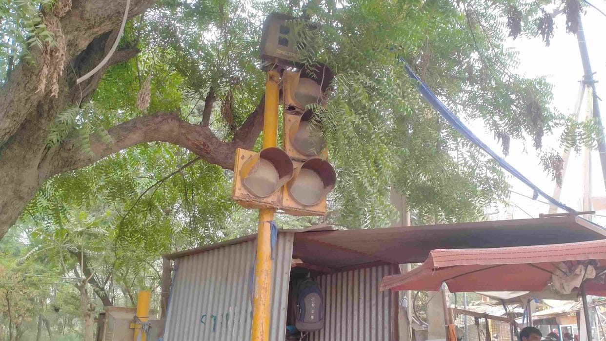The city's traffic lights lying among the junk are gathering dust