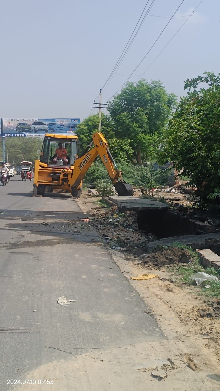 When the poles opened in the rain, cleaning of drains started.