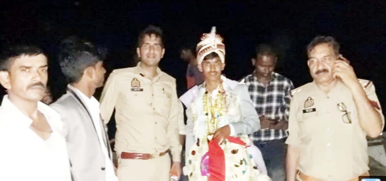 Police took the wedding procession to the bride's house by boat and tractor