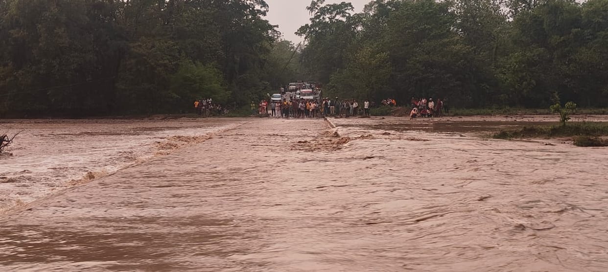 Sher and Surya drain came in spate, youth riding a bike saved from being swept away