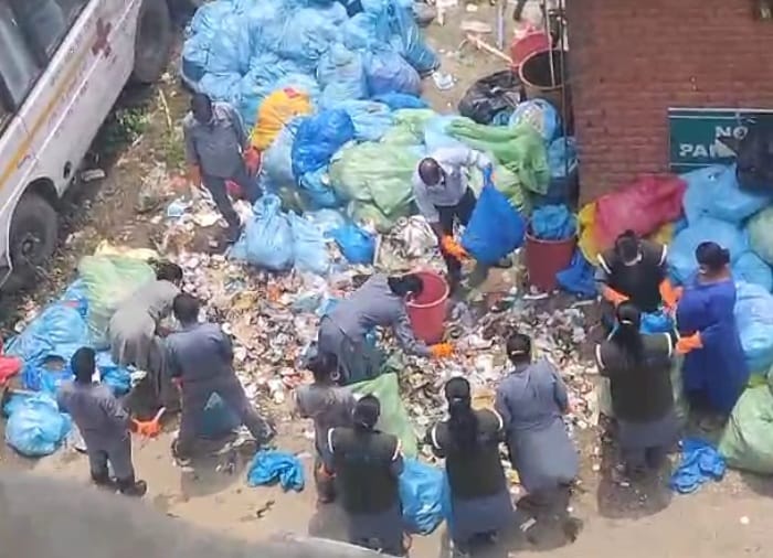 Three carts of garbage returned from dumping site, hospital cleaning staff laid off