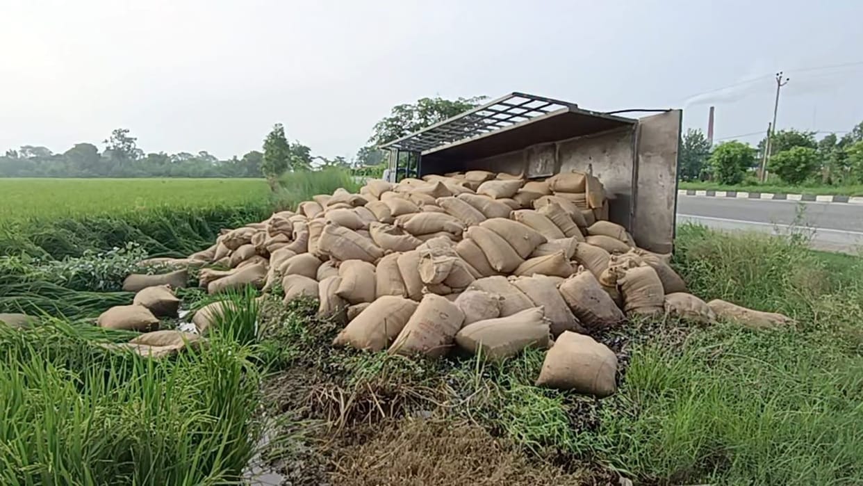 Dumper hits tractor-trolley loaded with wheat sacks
