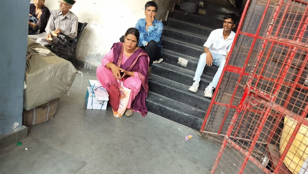 Chairs broken, benches less, passengers standing waiting for buses