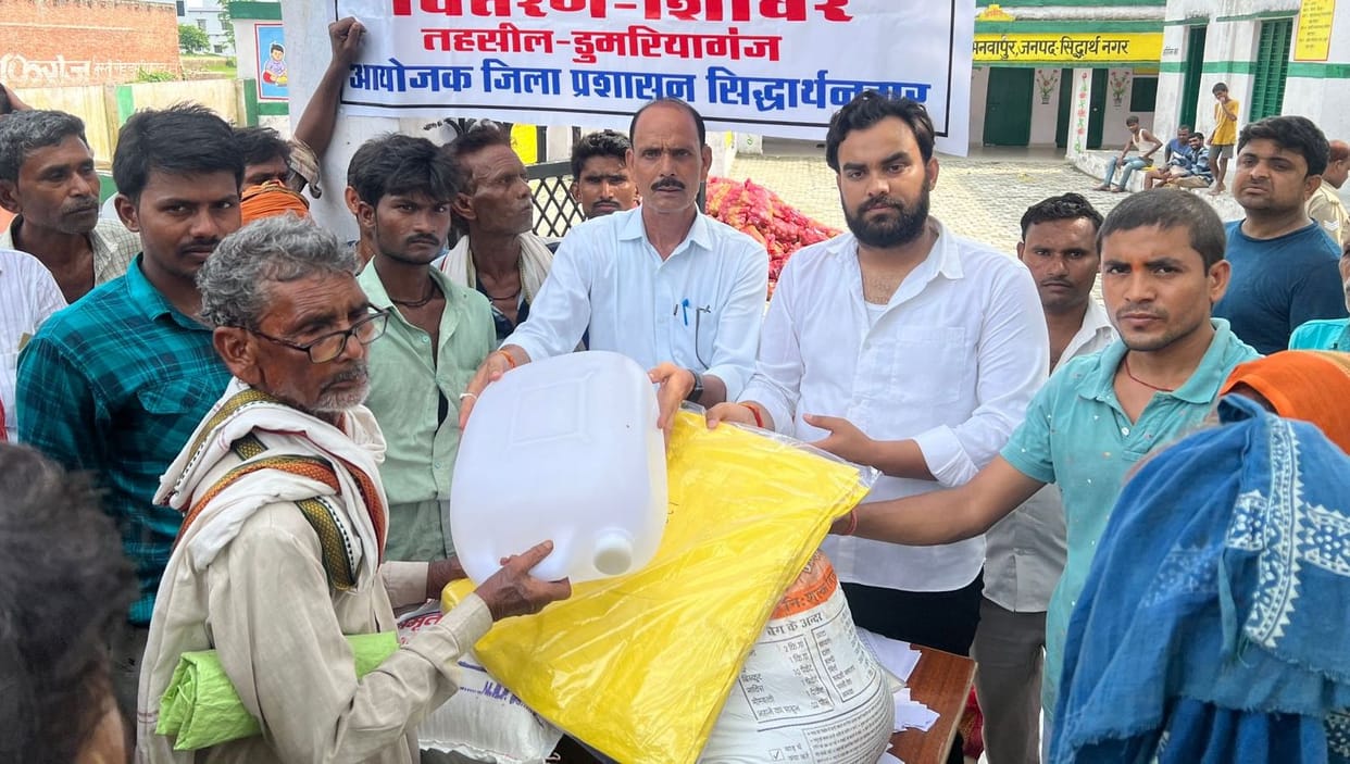 BJP leader distributed relief material among flood victims