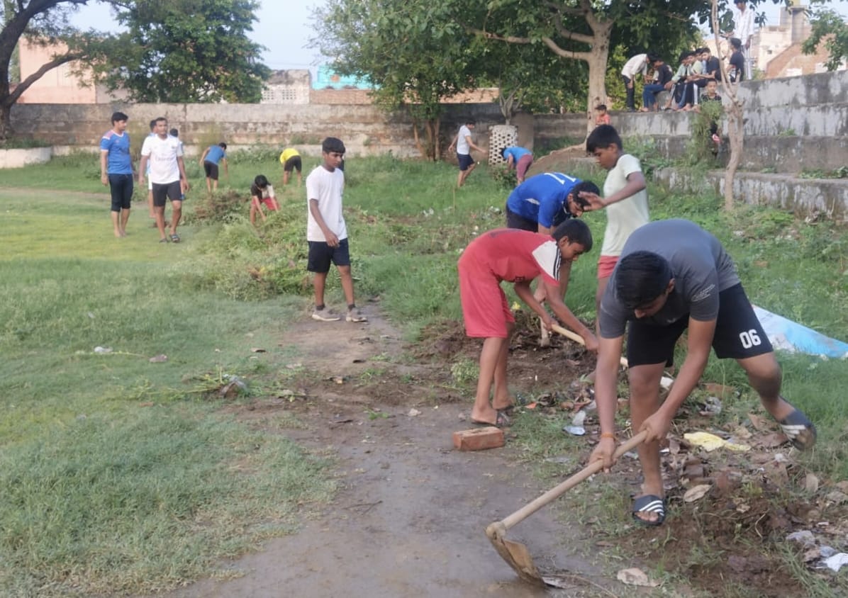 Gave the message of cleanliness by cleaning the football playing field
