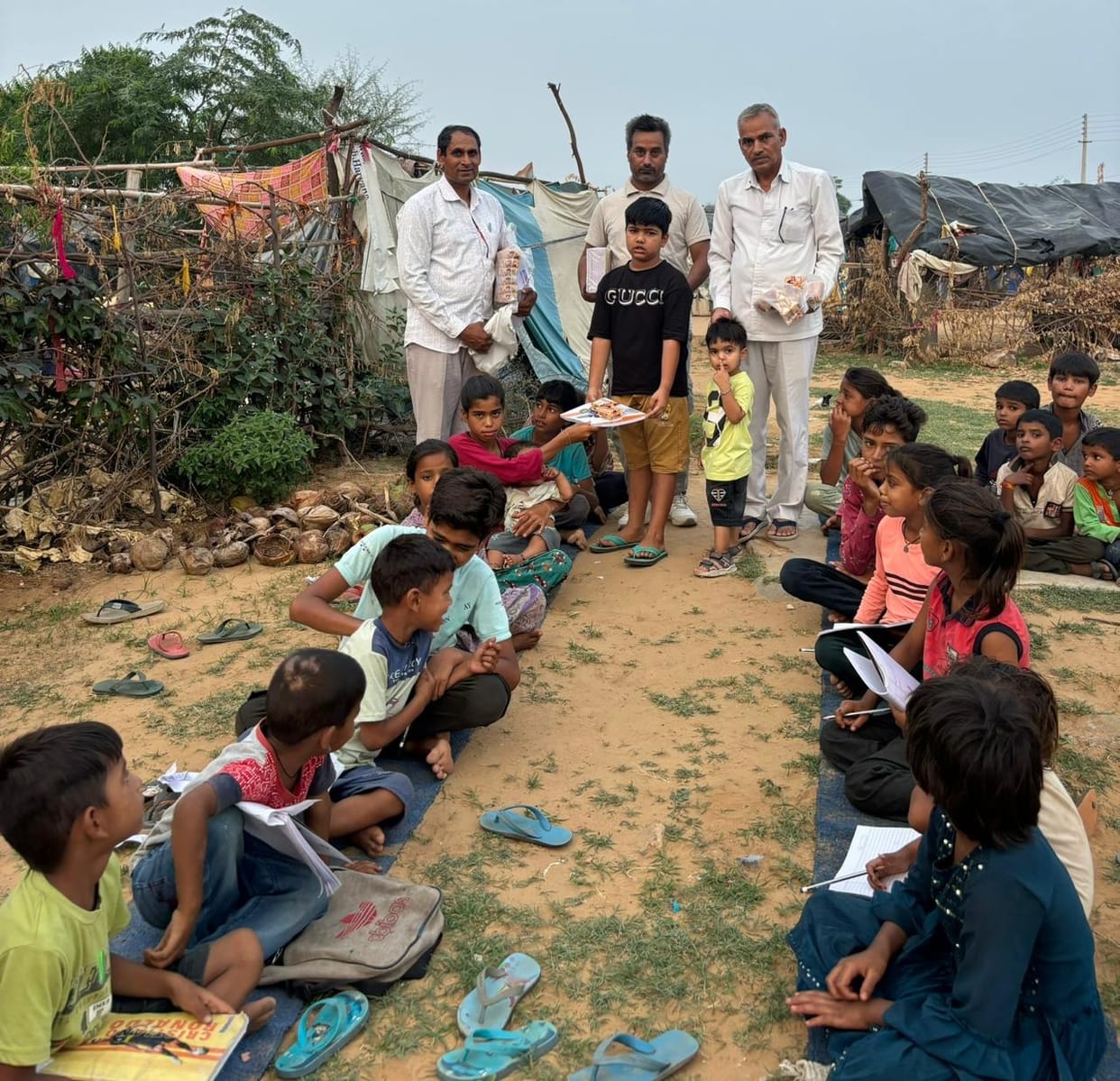 Celebrated birthday by distributing study material in slums