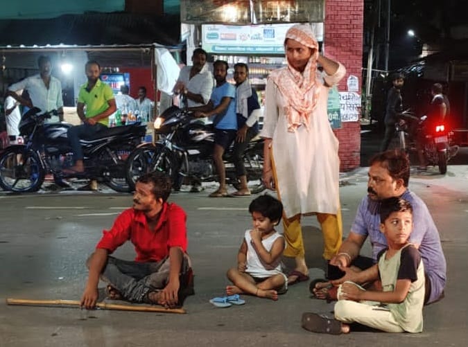 Waterlogging in house, hurt family sitting on road