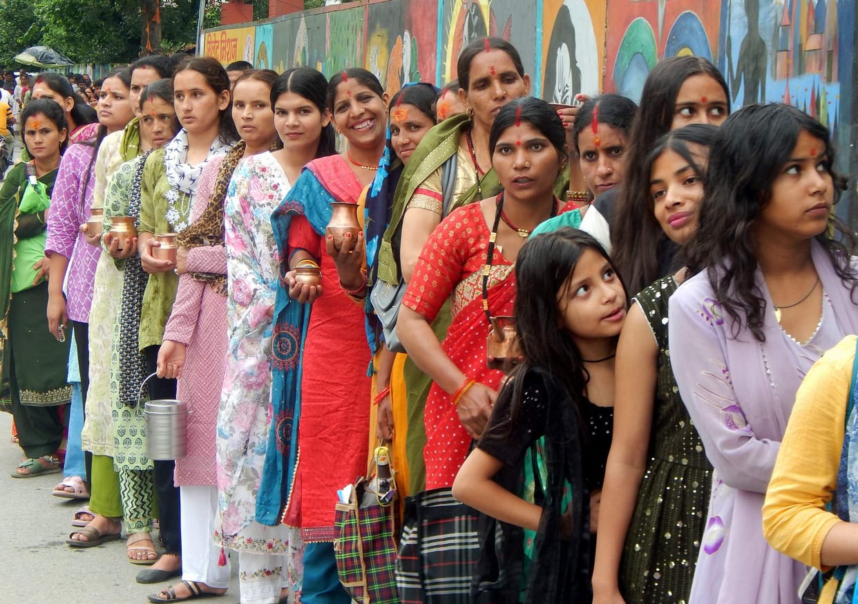 The cheers of Bam-Bam Bhole echoed amidst the rain.