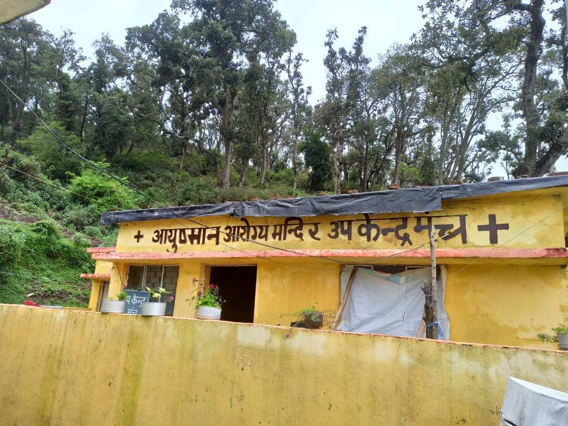 Rain water inside Talladesh hospital, patients outside