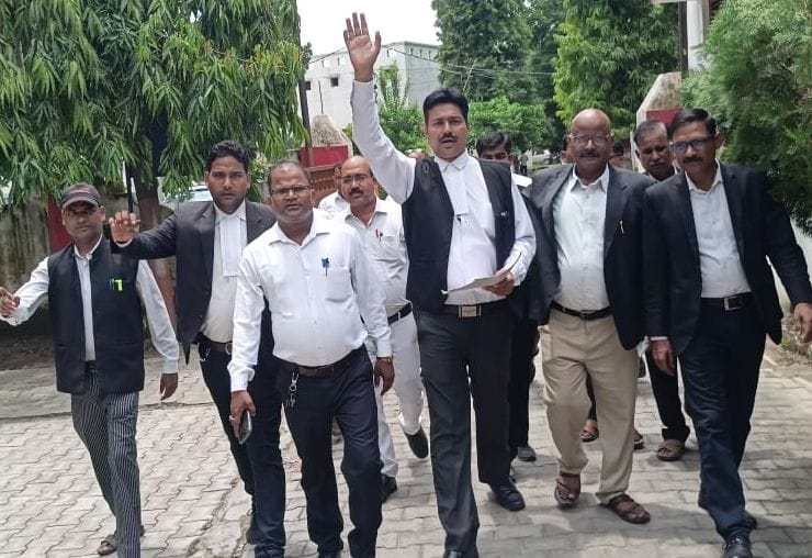 Advocate angry over filing FIR against partner, protest in Collectorate