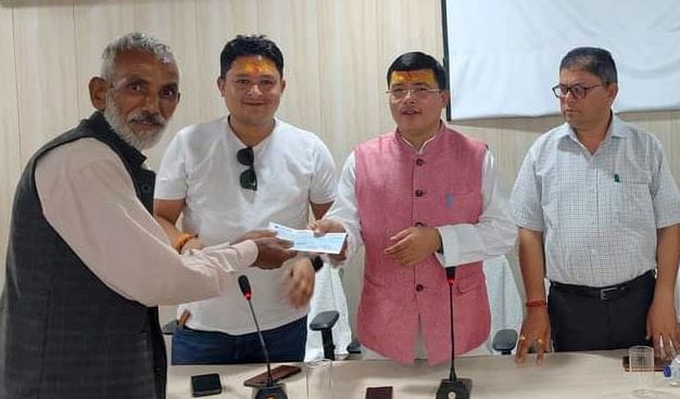 Compensation checks distributed to 114 beneficiaries