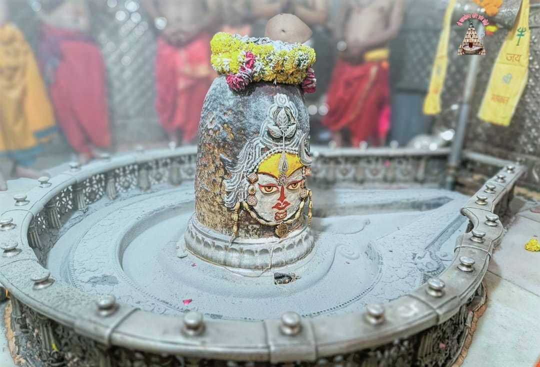 Baba Mahakal decorated in Bhasma Aarti with moon and bill leaves