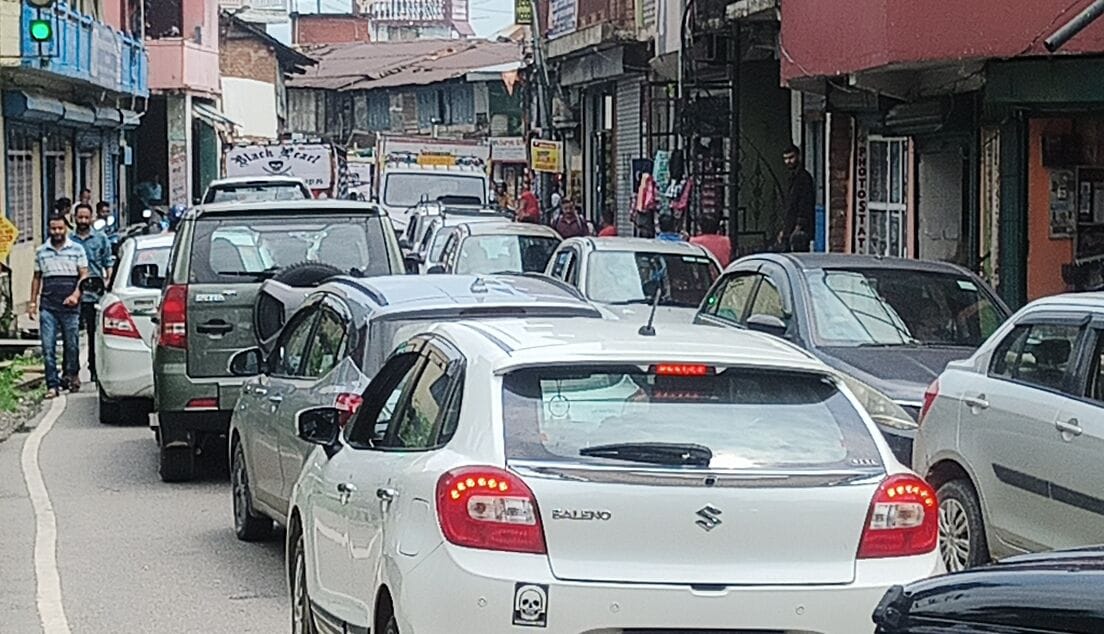 An altercation between the scooter and the car driver stuck in the jam