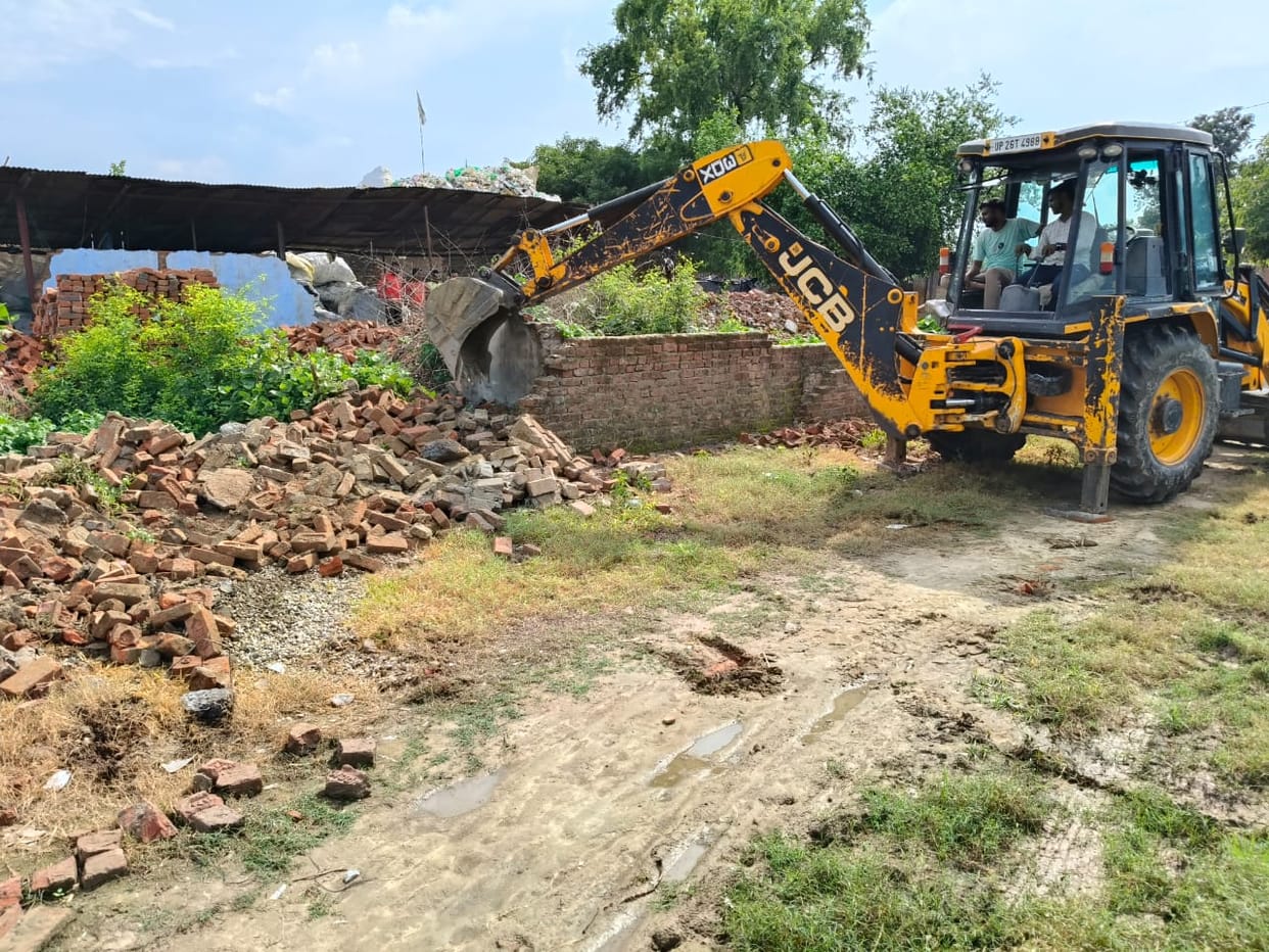 They occupied the land and built a wall, the administration demolished it