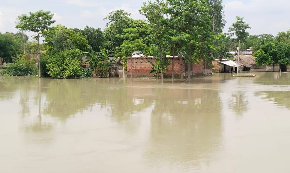 Flood: Many villages became islands...river water flowing on the roads