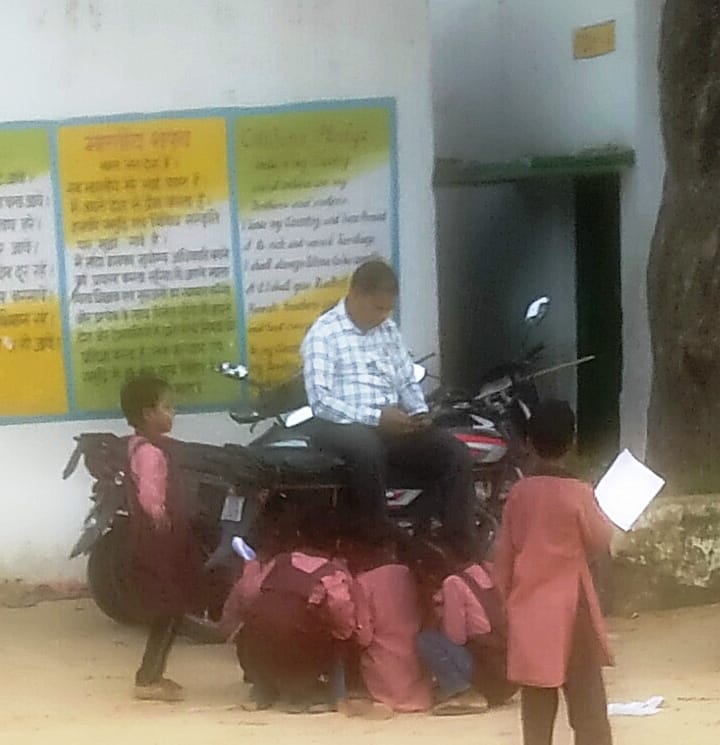 Answer sought on teaching children sitting on a bike