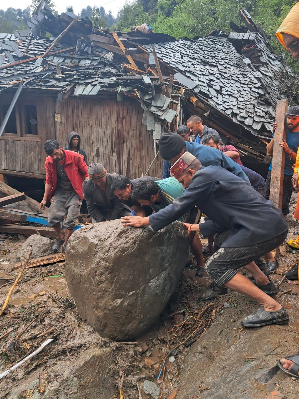 Search continues even in light rain, preparations to break big rocks