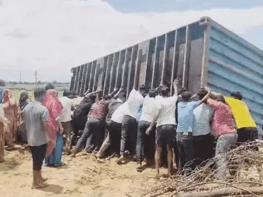 Troubled by opening of liquor vend, villagers blocked the road
