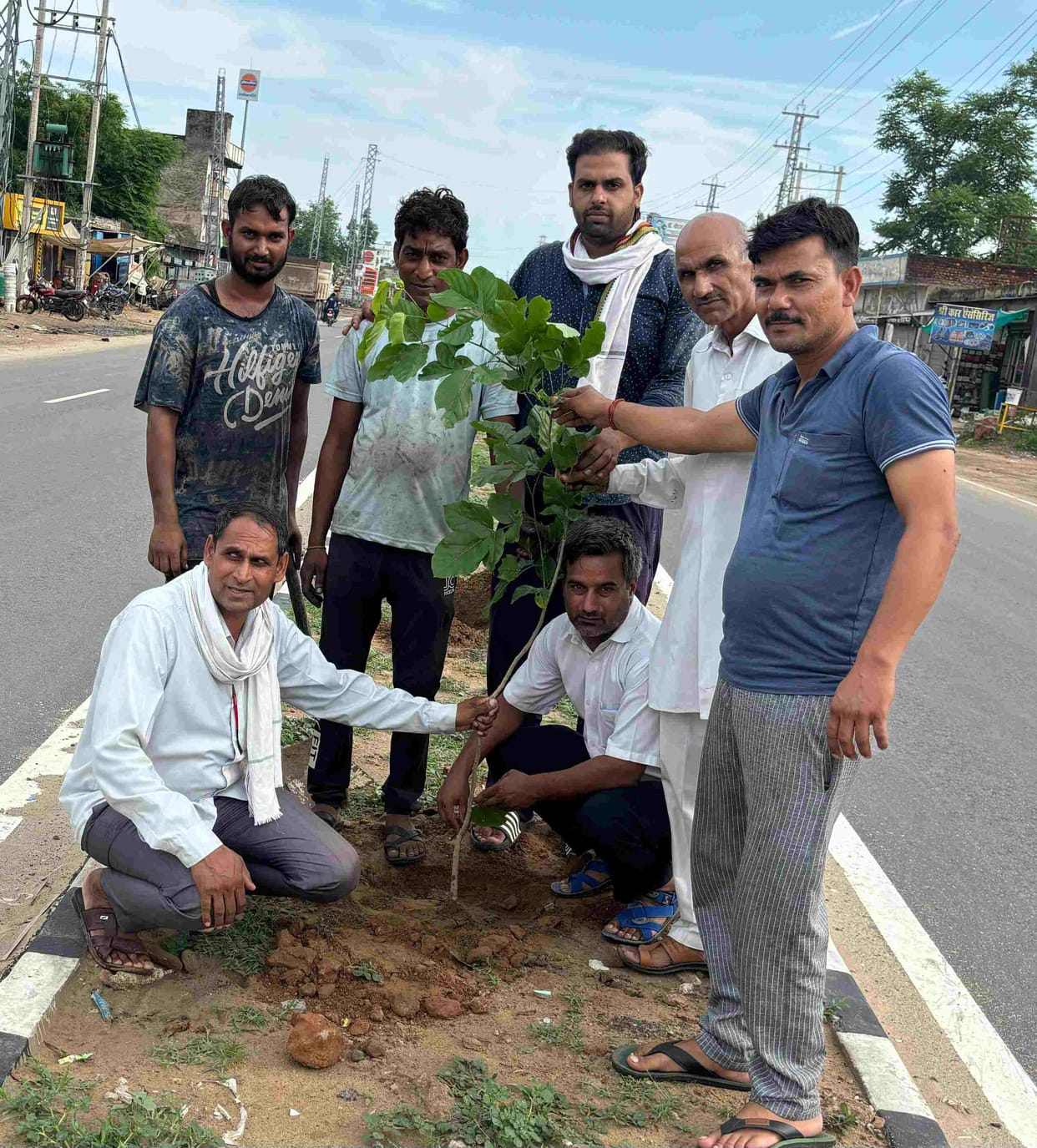 Shopkeepers took responsibility of protecting trees by planting them