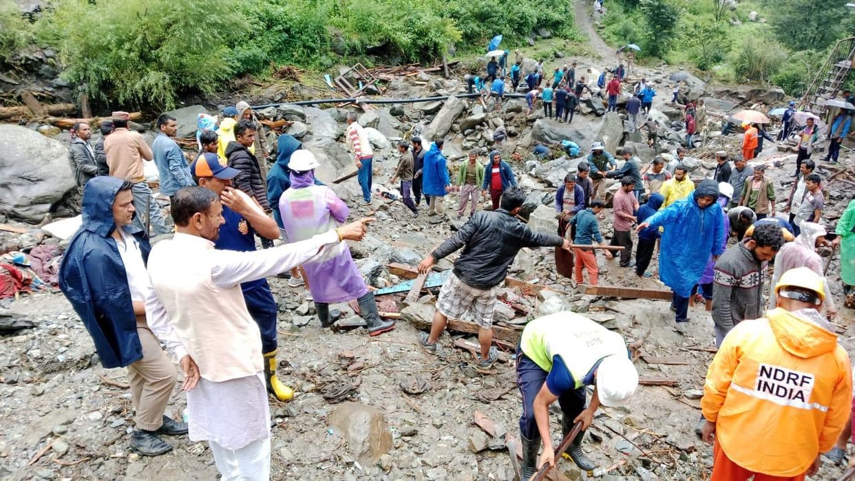 Search continues for missing people under debris amid rain