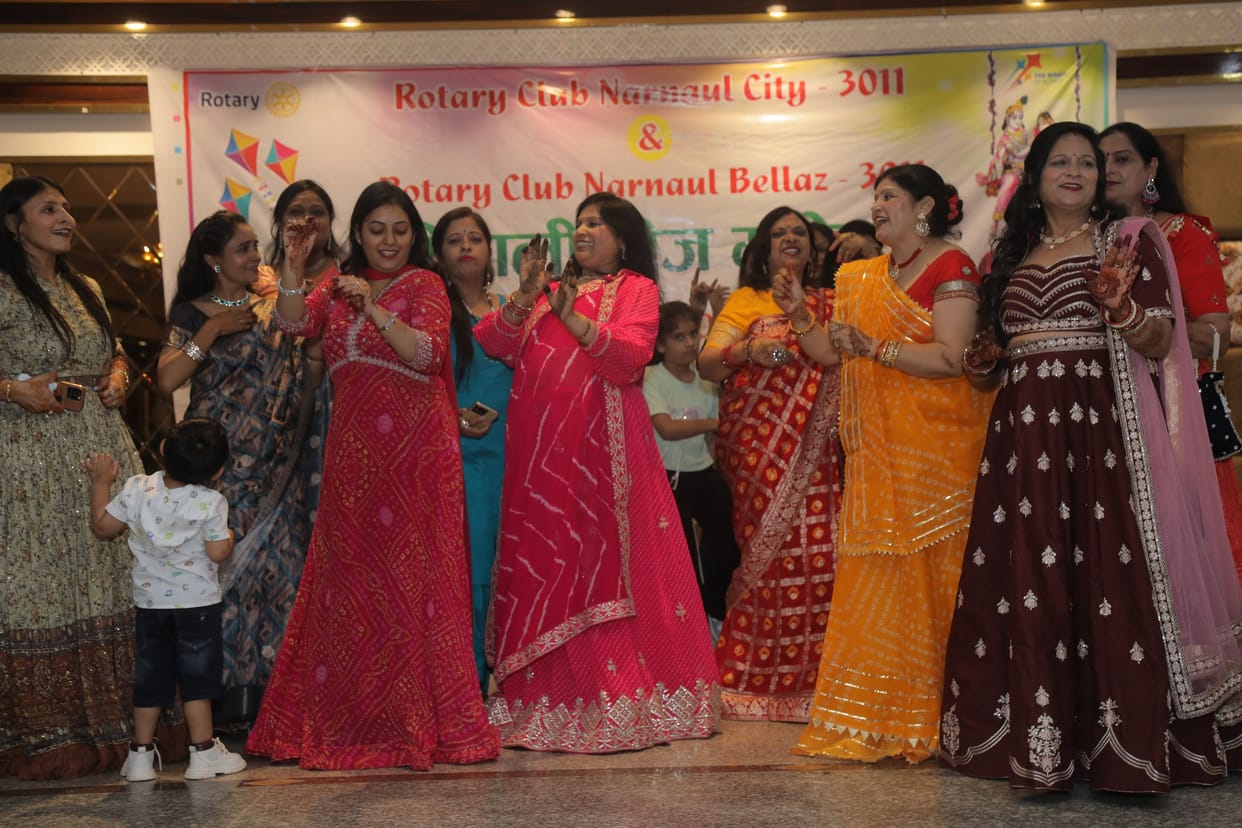 Women celebrated Teej festival by applying mehndi and swinging.