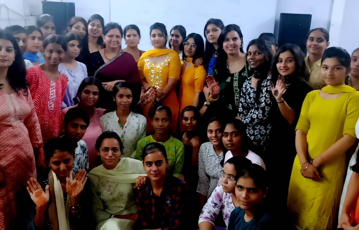Mehndi competition organized among staff and students