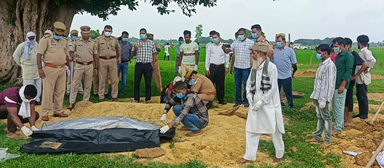 The woman's body was taken out of the grave in the presence of the magistrate.