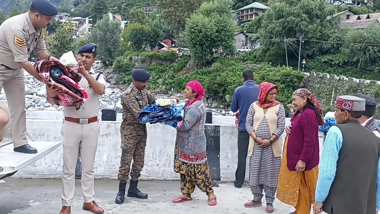 Police distributed relief material to flood victims