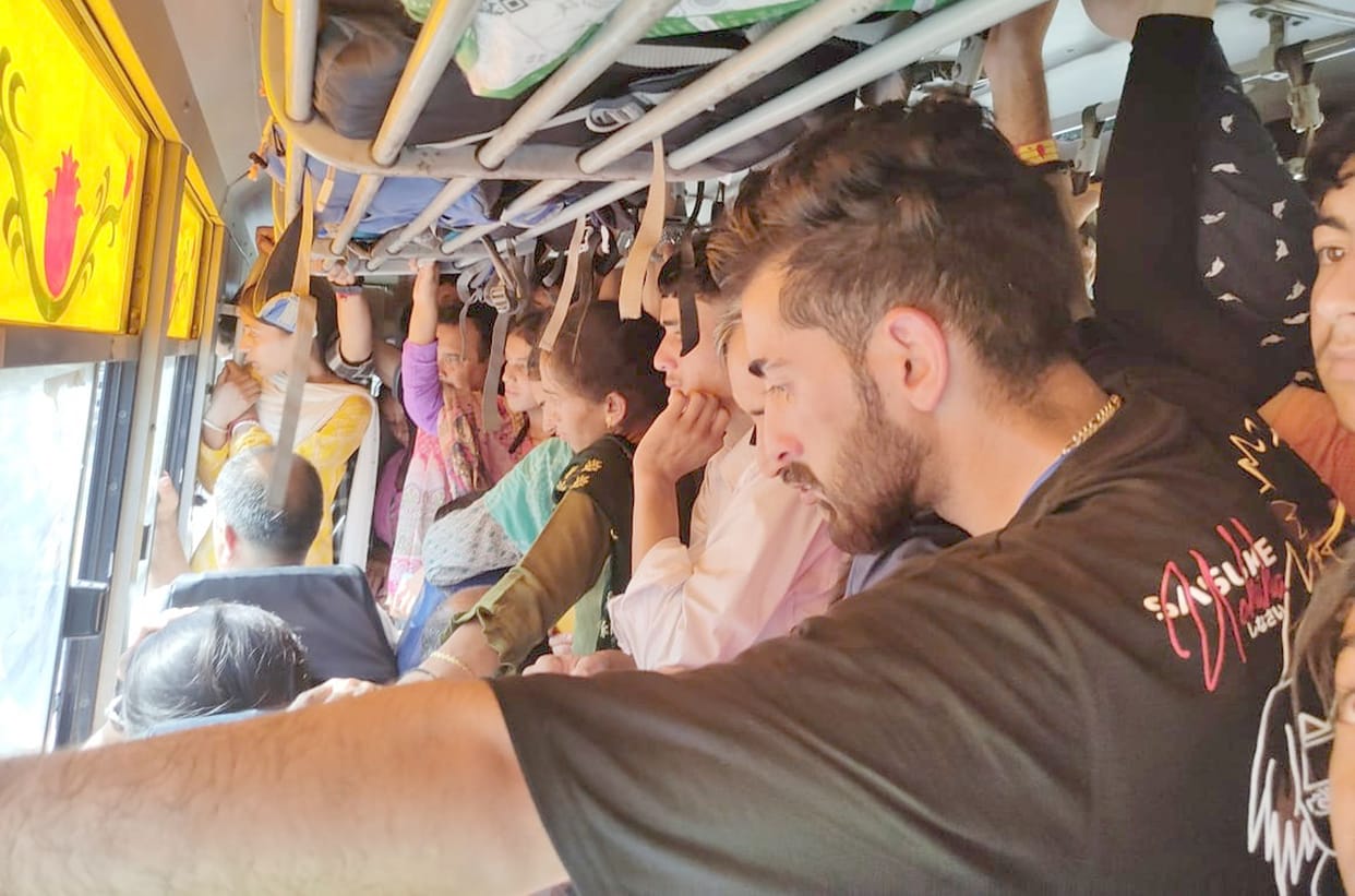 Passengers crammed into long distance bus