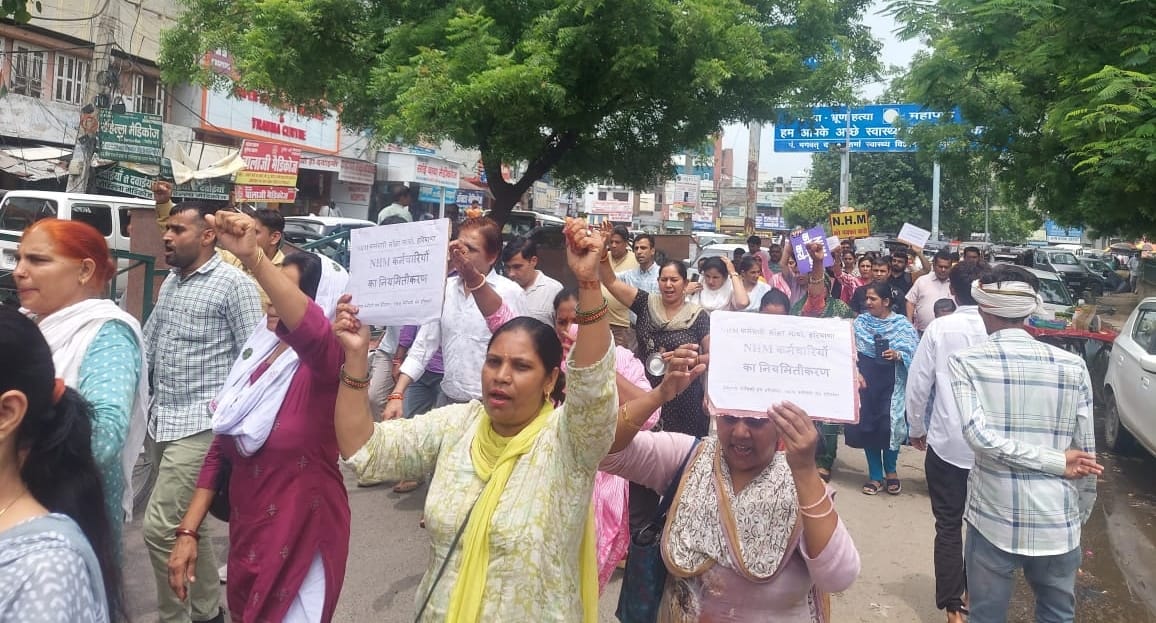 NHM employees took out a foot march