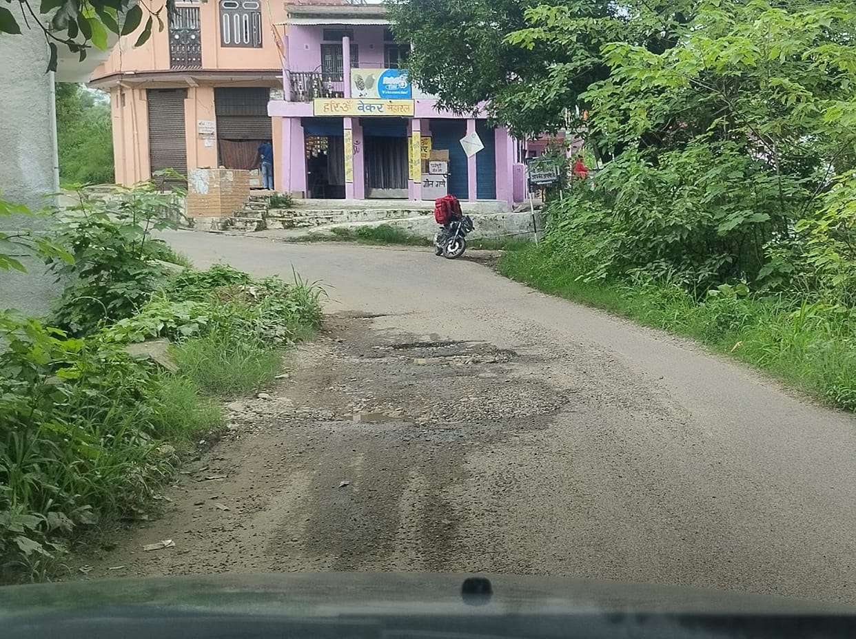 People troubled by potholes on Ghodi-Dhabiri road