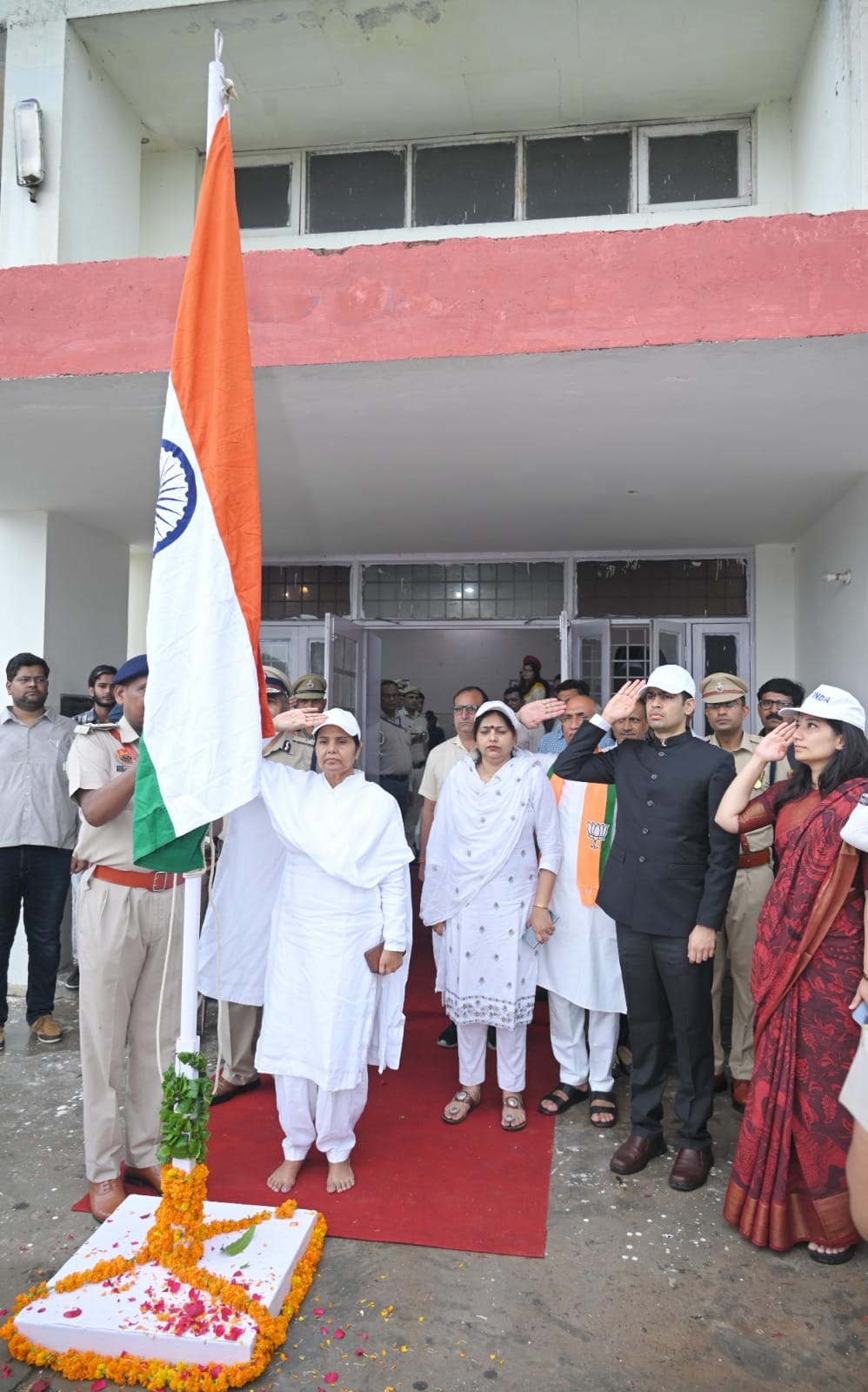 Celebrated independence by hoisting the flag