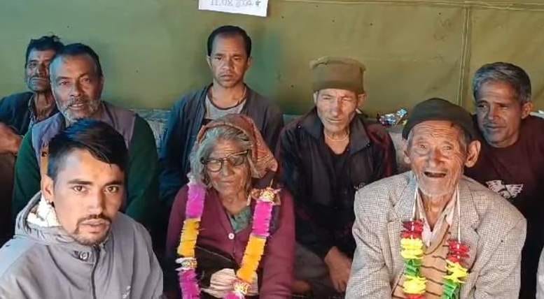 Elderly people sitting on hunger strike for road