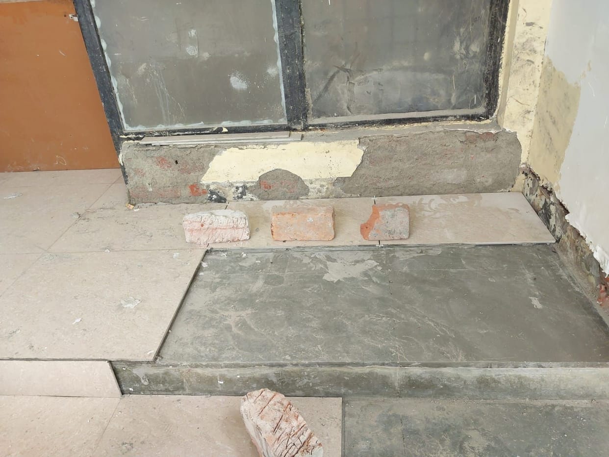 Tiles being installed in blood bank without breaking the floor