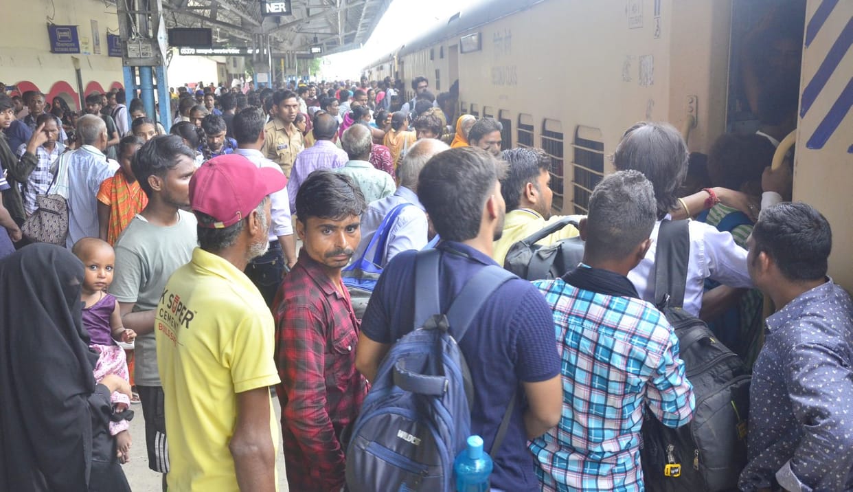 Roadways buses were jam packed, people had to travel hanging in trains