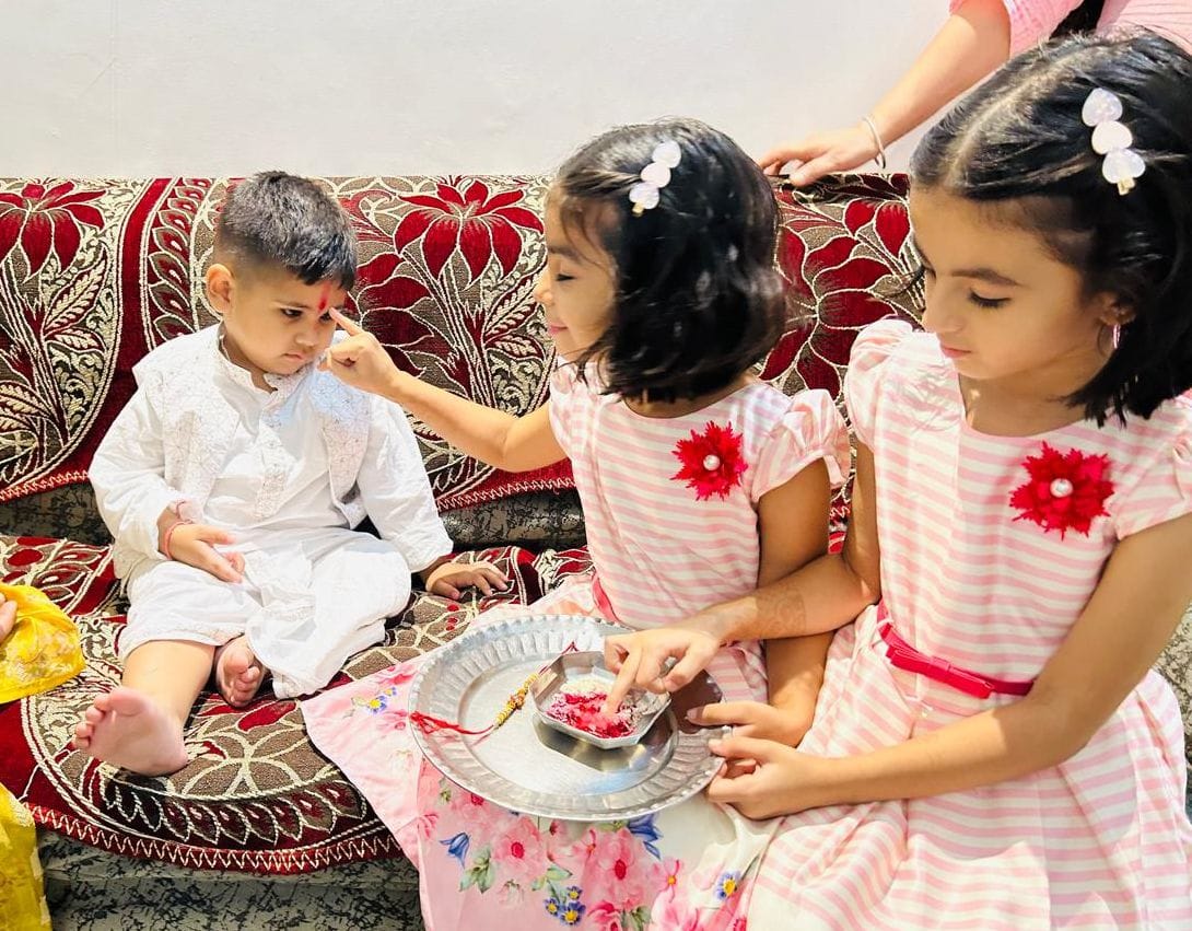Sisters tie Rakhi to brothers and pray for long life