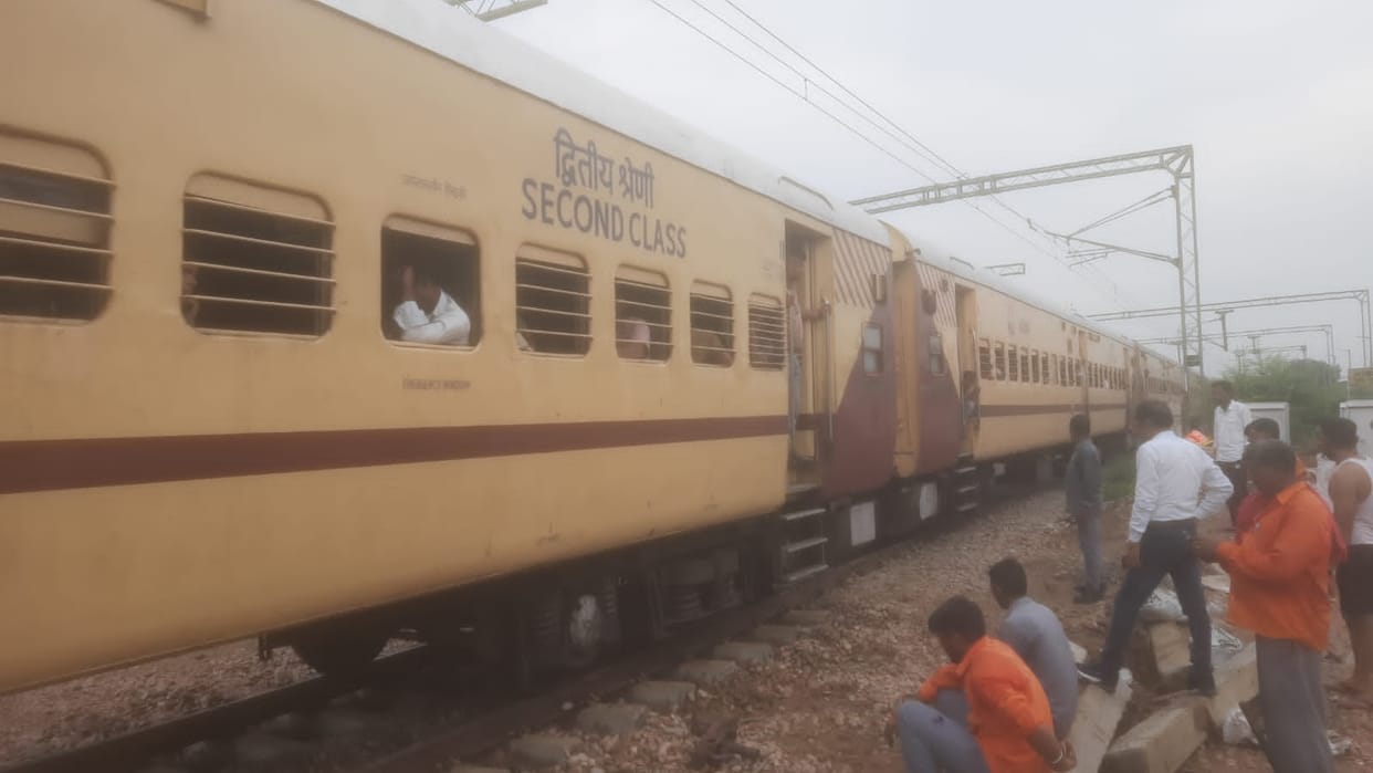 Due to rain, soil slipped from under the railway track