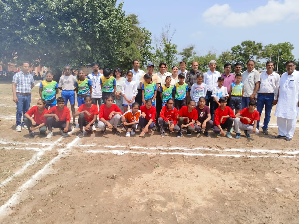 Players before the competition in Kulari. Along with coaches and staff members