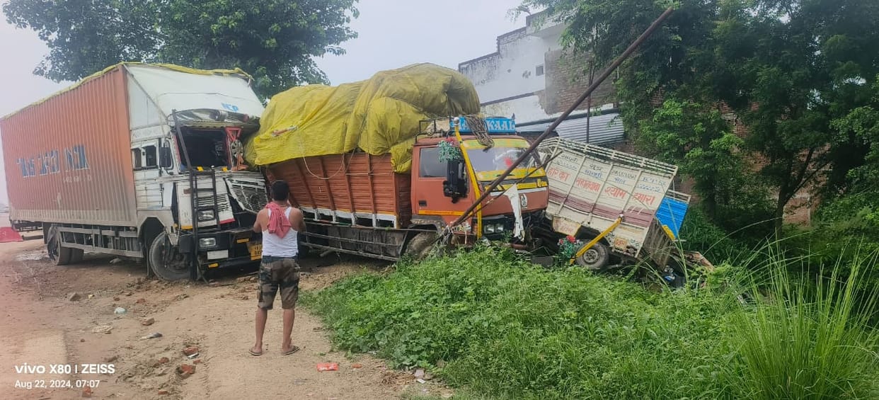 Uncontrolled container collides with DCM and loader standing on the side of the highway, one injured