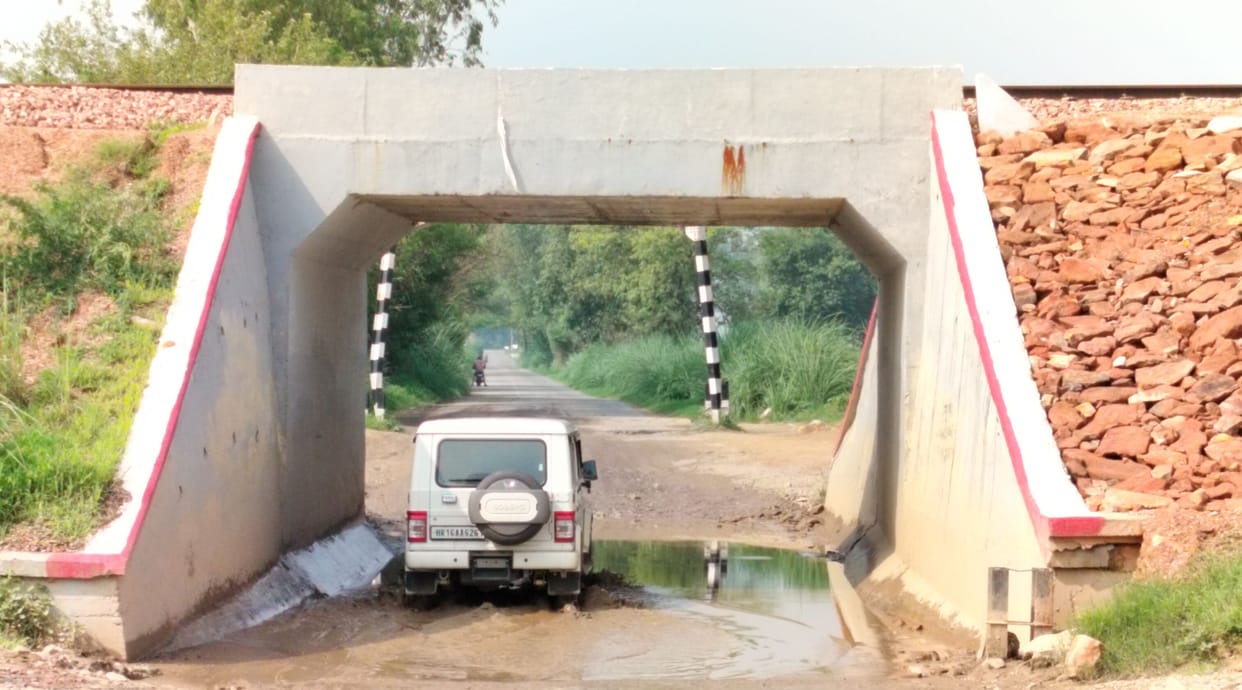 Underpasses built on rural connectivity routes become shelters for rainy season.
