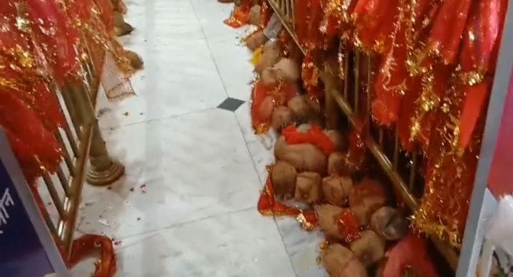 Pile of coconuts near the entrance of the temple, not removed even after the fair is over