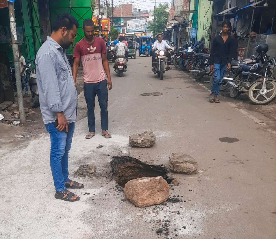 Five feet deep pit formed due to road collapse, trolley wheel stuck