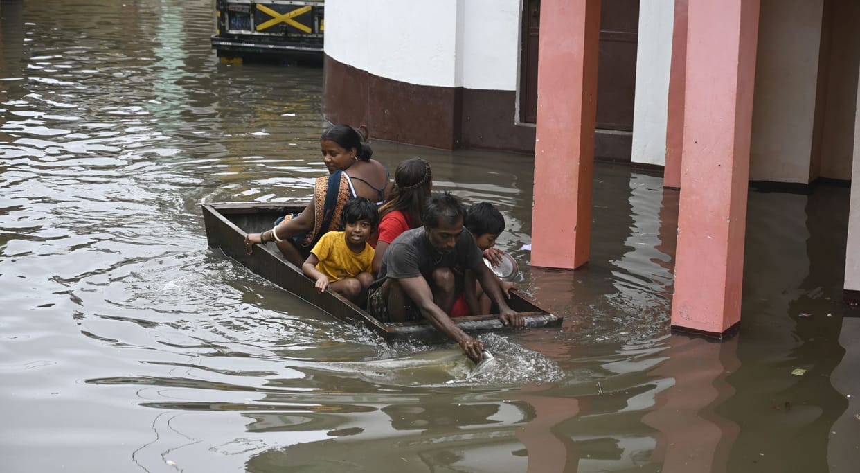 Cities filled with rain, neighborhoods become islands