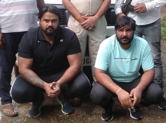 Two accused of firing in property dealer's office arrested
