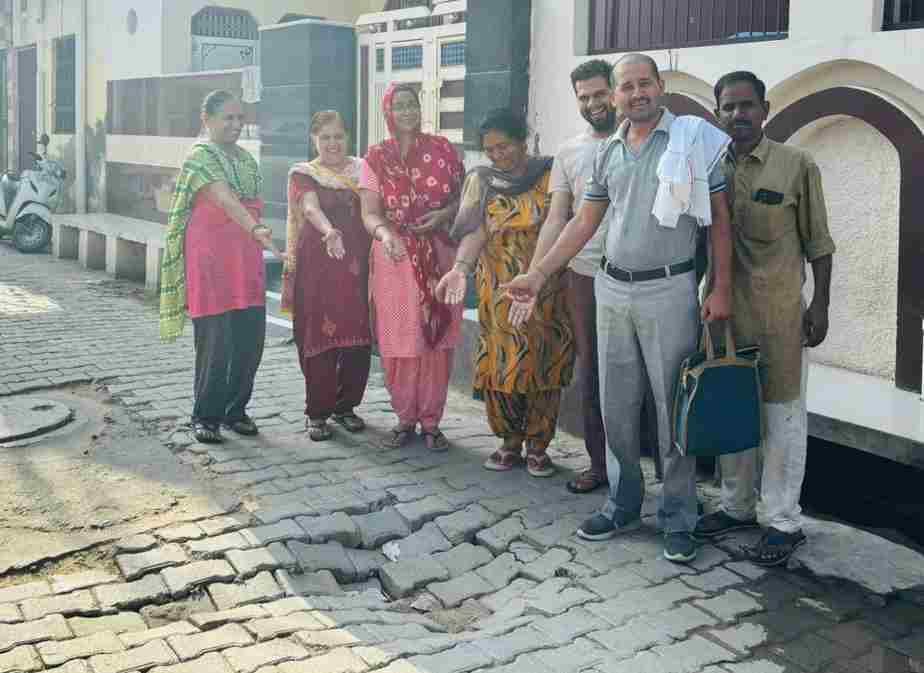 There are potholes everywhere on the road leading to the ancient Radha Krishna temple, people are troubled