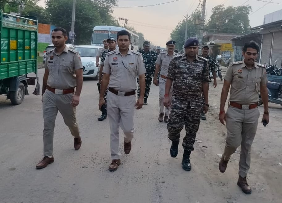 Police and paramilitary forces took out flag march