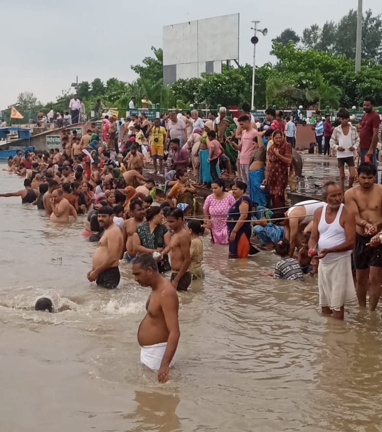 Devotees take a dip of faith in Ganga on Somvati Amavasya