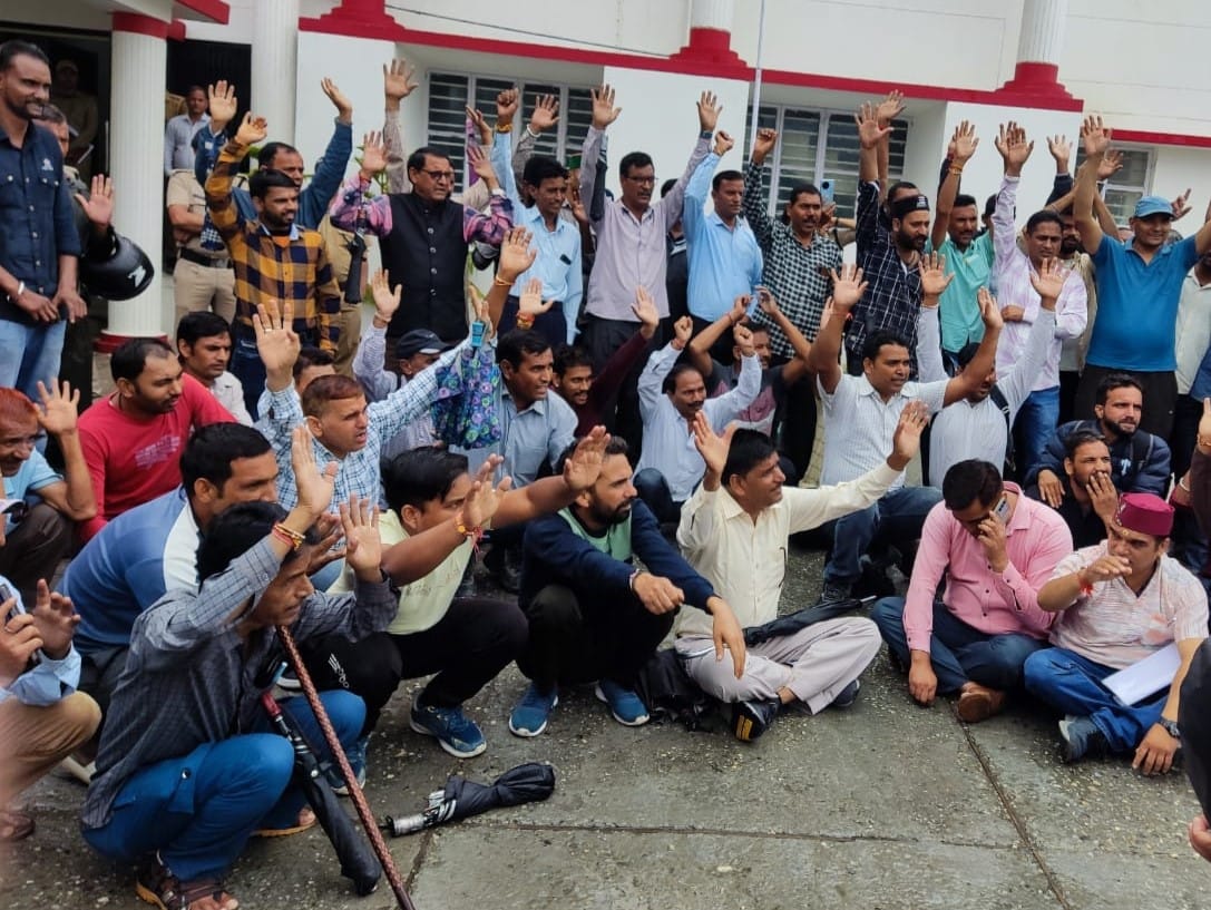Demonstration at the Collectorate demanding restoration of service