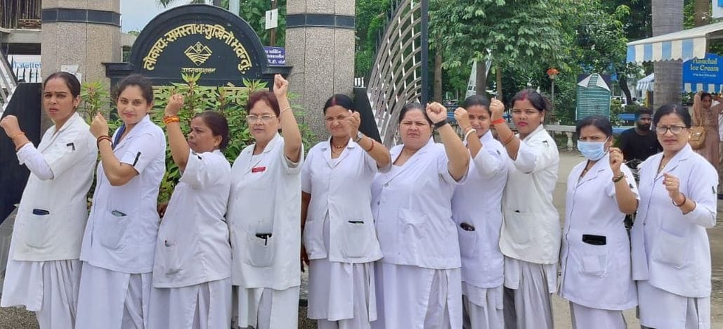 Expressed anger by tying black band for old pension